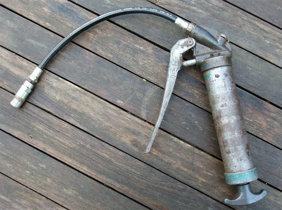 Old and dirty grease gun